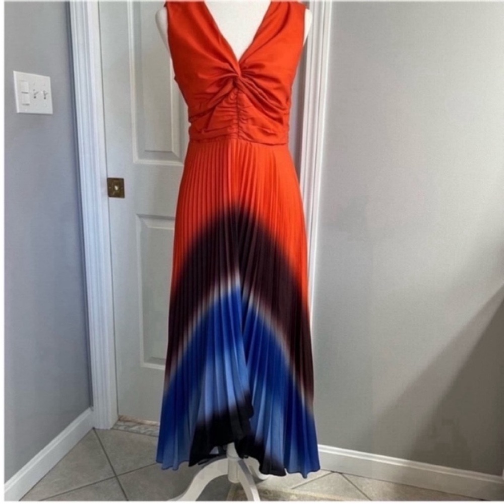 Adelyn Rae Orange/Blue
Assymetrical Pleated Maxi Sundress
Size L